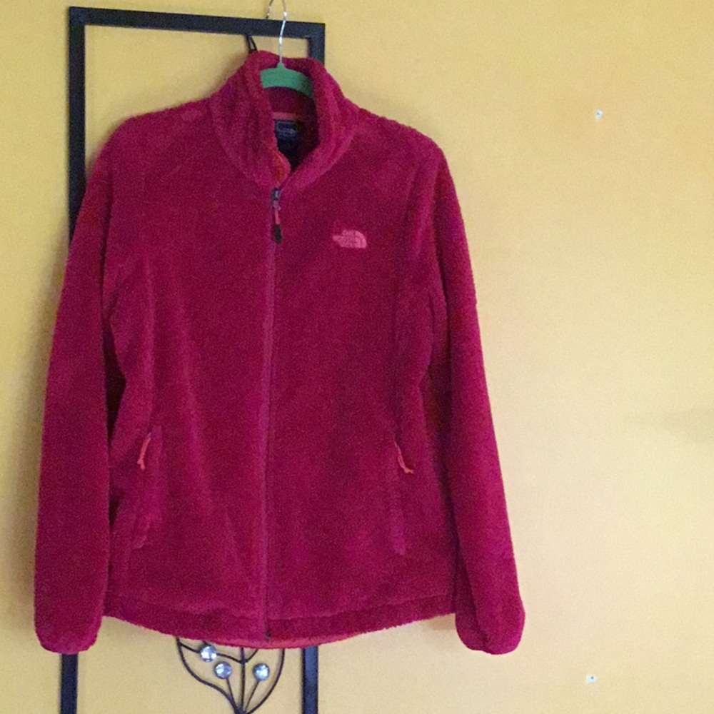 Zipped front sweater. Two pockets with zipper.